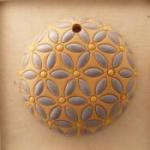 round, blue lieves, yellow dots