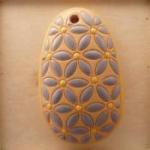oval, blue lieves, yellow dots