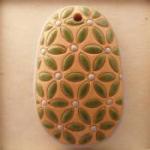 oval, green lieves, blue dots