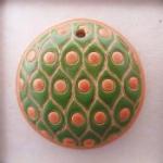 orange dots on green background