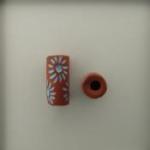 Turquoise daisies on terracotta