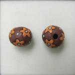 orange flowers on terracotta
