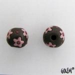 pink flowers on dark clay