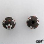 white flowers on dark clay