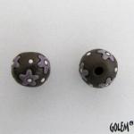 purple flowers on dark clay