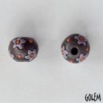 purple flowers on dark clay round bead