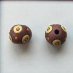 yellow circles on terracotta