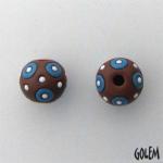 neon blue circles on terracotta