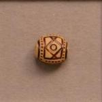 Off-white flat bead, brown lines