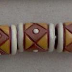 Yellow triangles on terracotta