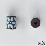 Turquoise leaves, white dots on dark