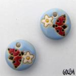 Ladybug & flower on blue