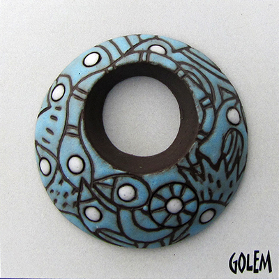 Round off center donut pendant,turquoise on dark