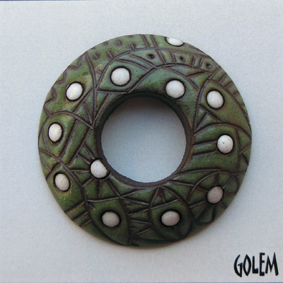 Round donut pendant, green on dark